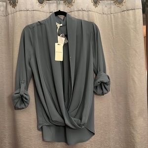 Pleione surplace wrap blouse